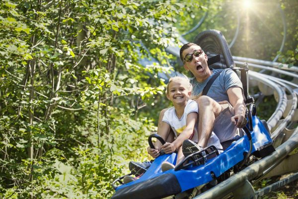 Man,And,Girl,Enjoying,A,Summer,Fun,Roller,Coaster,Ride.